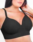 Black bra worn by a model on a white background
