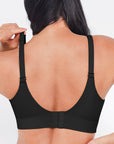 Black bra worn by a person on a white background
