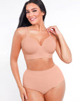 Woman wearing a beige shapewear bodysuit on a white background
