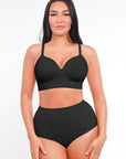 Woman wearing a black bikini set on a white background